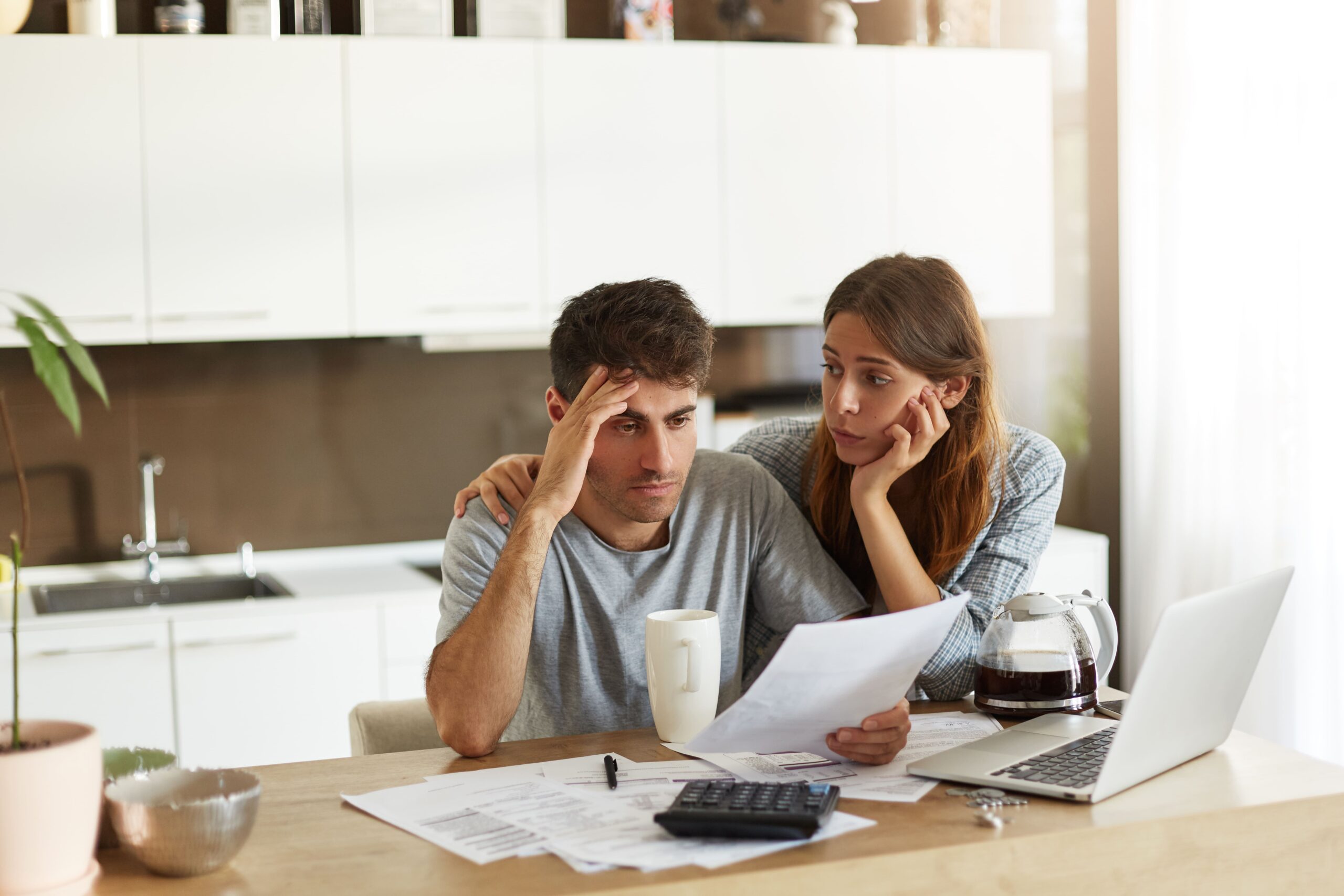 young-couple-checking-their-family-budget