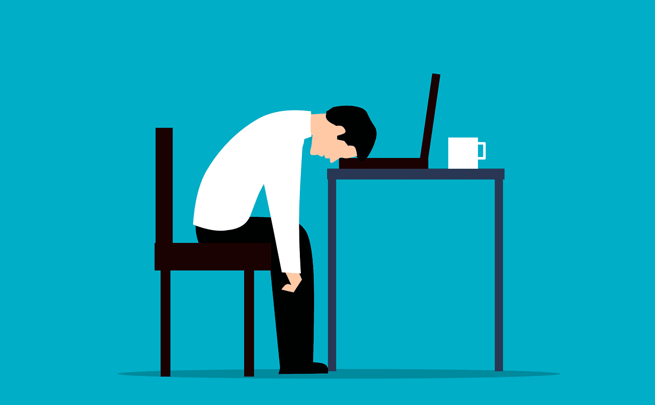 2d illustration of a man laying his head on his desk, looking tired and sleepy